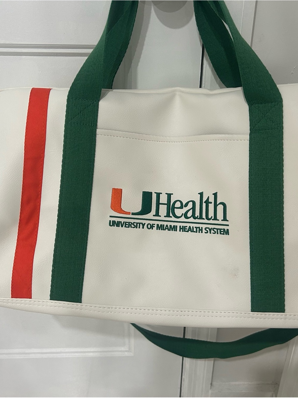 UHealth White Tote with Green Handles and Orange Stripe